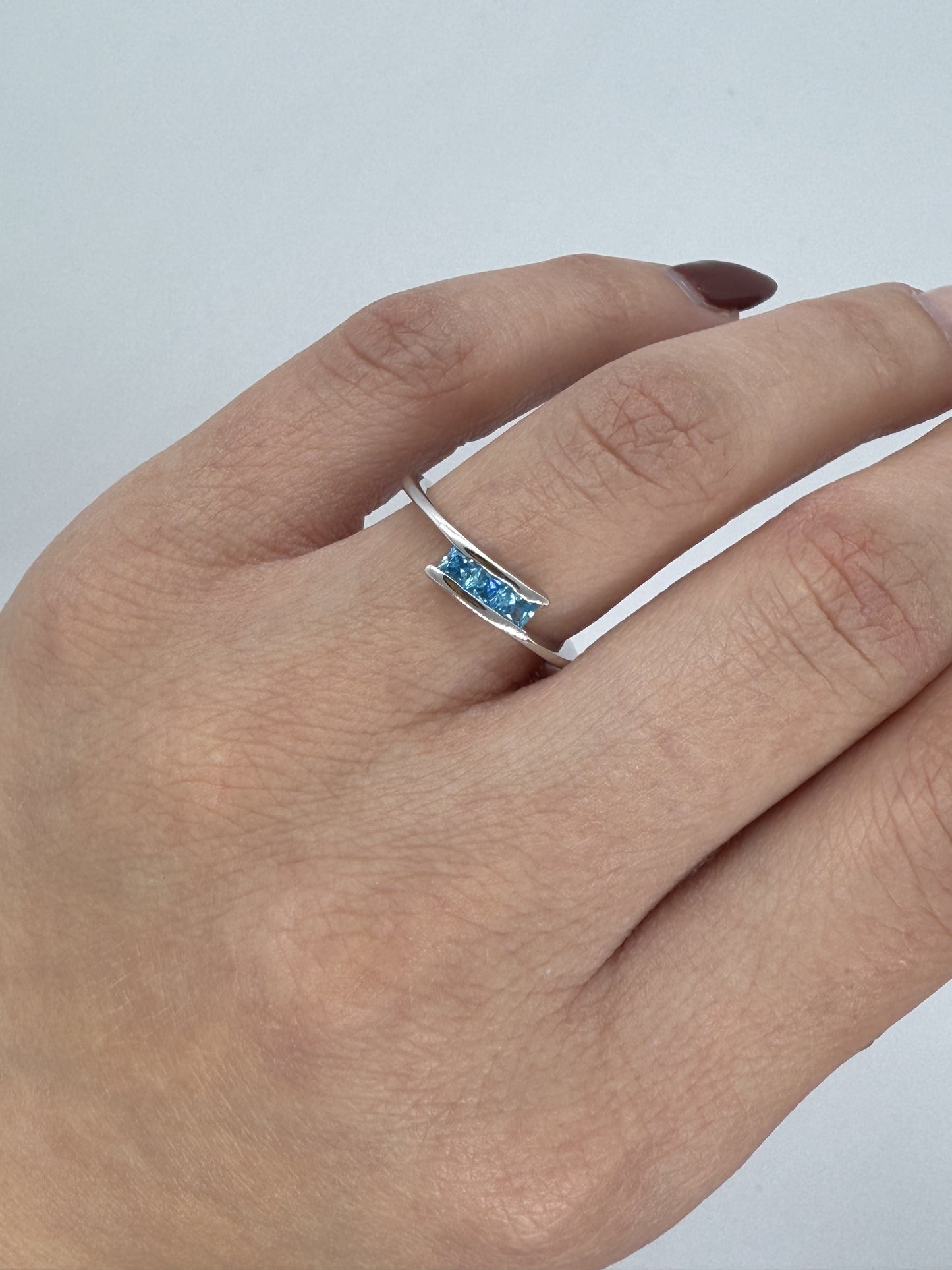 Elegant Sterling Silver Ring with Blue Topaz Gemstones