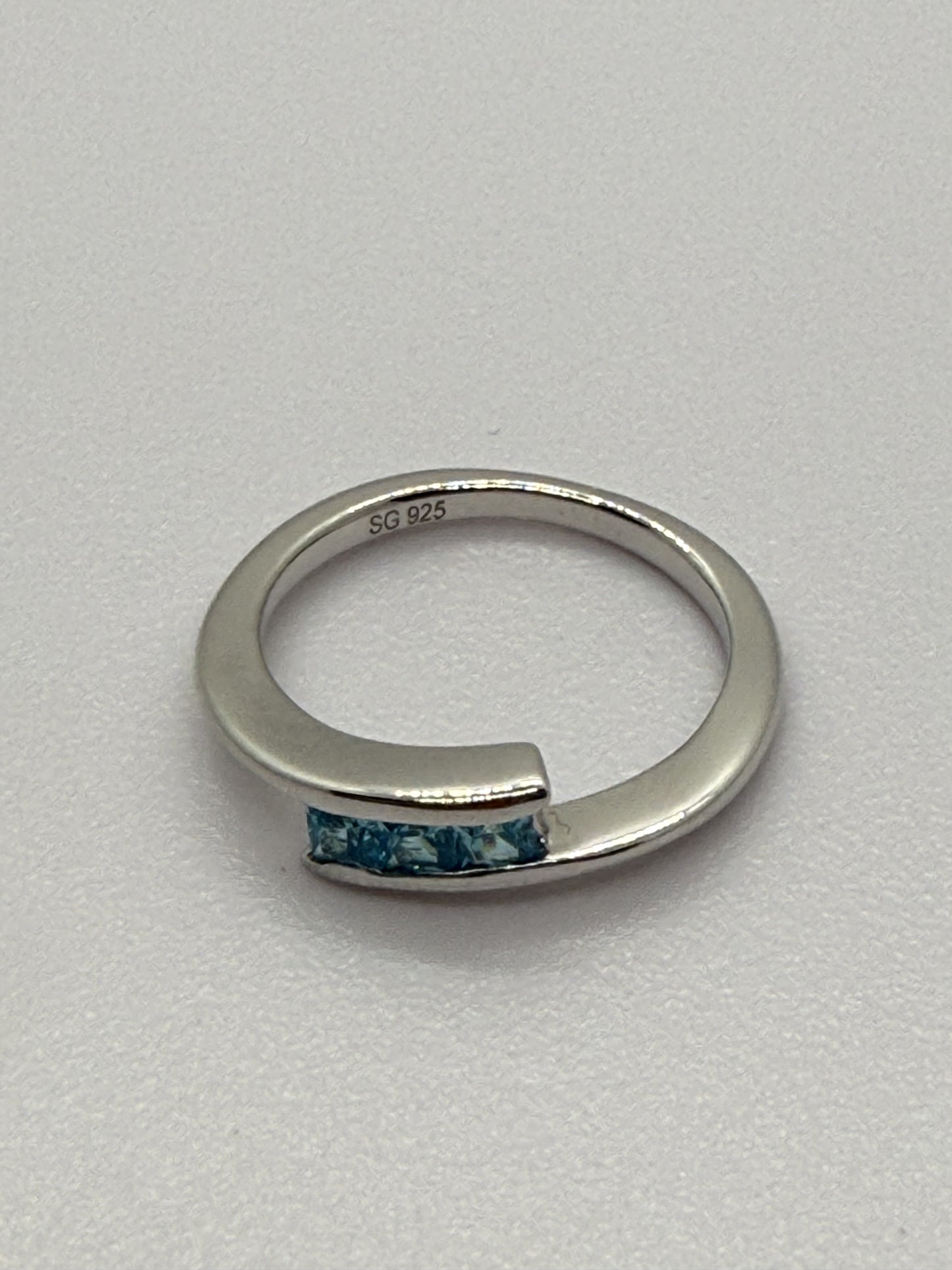 Elegant Sterling Silver Ring with Blue Topaz Gemstones