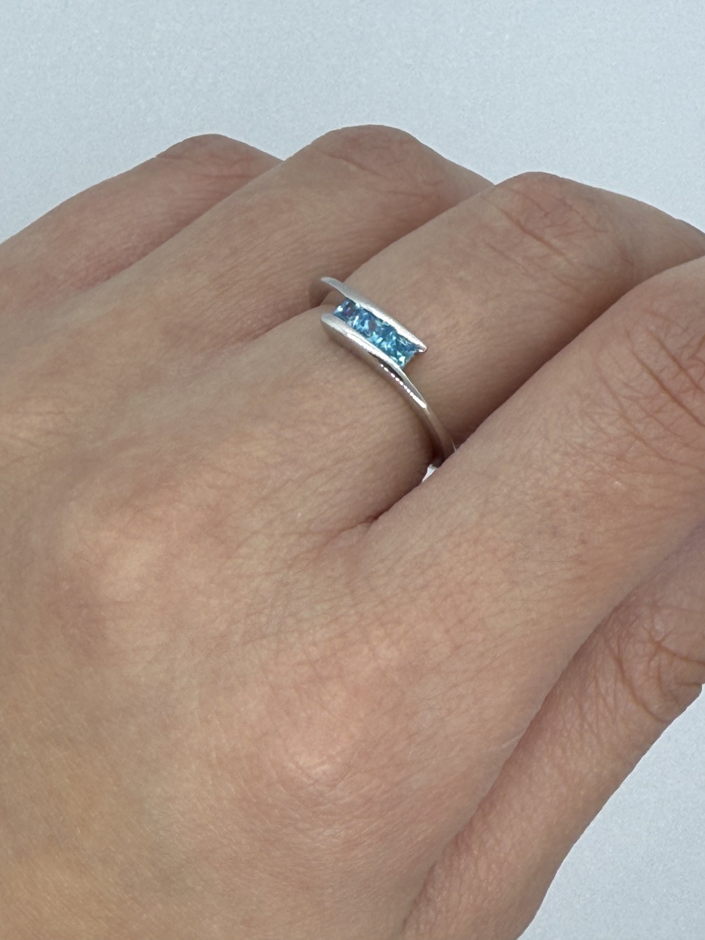 Elegant Sterling Silver Ring with Blue Topaz Gemstones